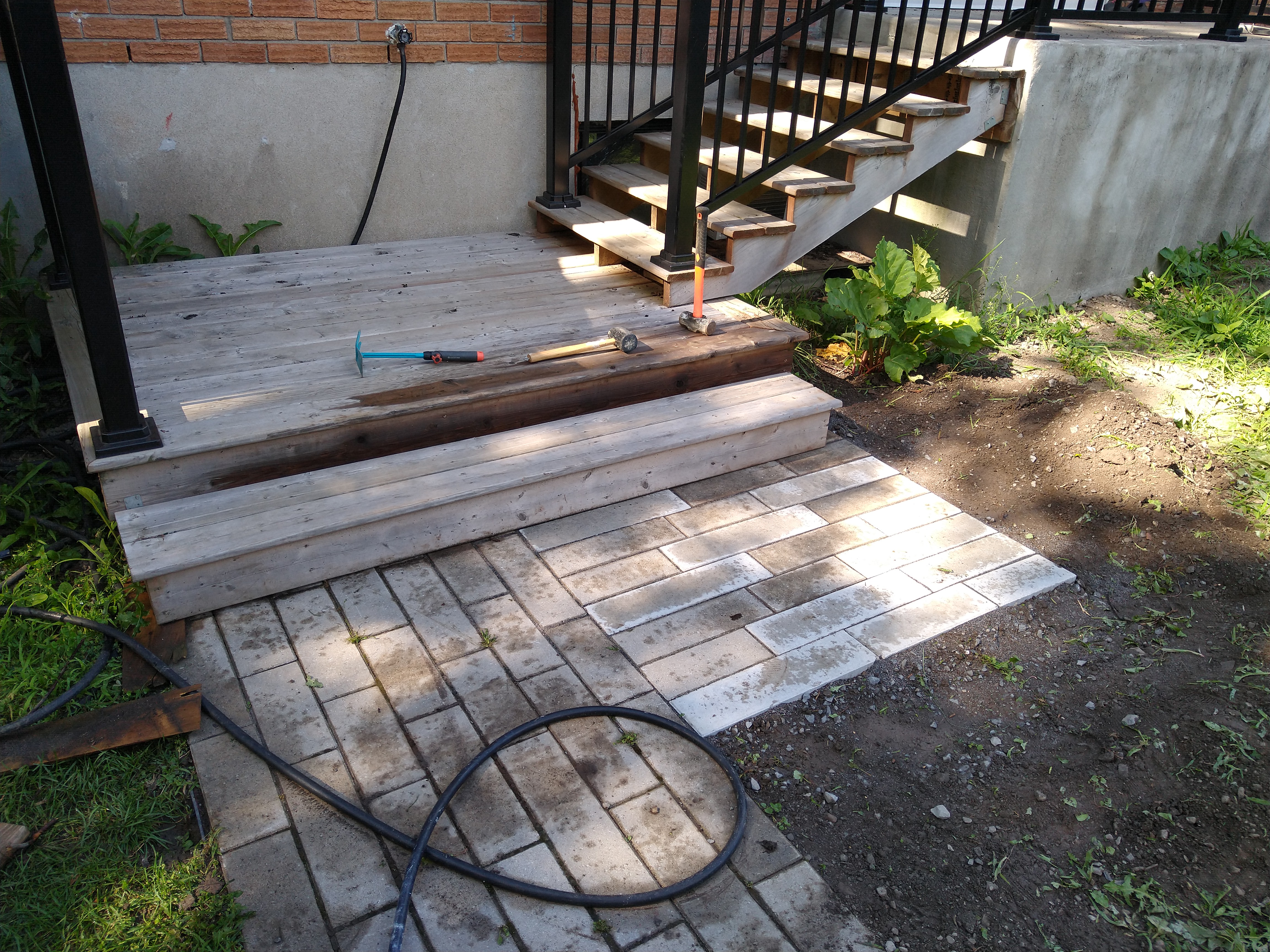 Figure 5: picture of the final result, showing pavers sidewalk and the stairs sitting on it properly.